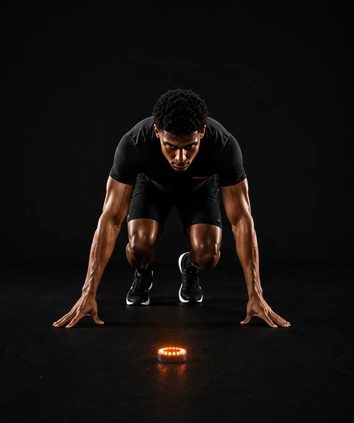 Athlete in sprint starting position, deciding response